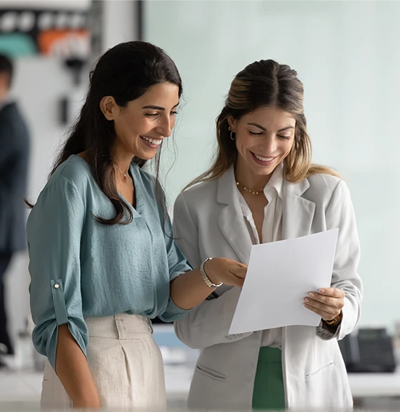 A user provides a five-star rating on a laptop, representing the high satisfaction and successful validation of Expert-Led Framework Development within an organization.